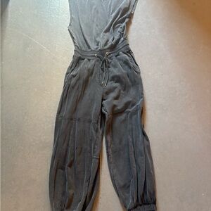 FP Movement Black Sleeveless Jumpsuit with V-Neck and Tie Belt